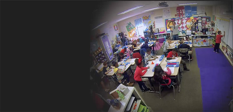 Film crew in a classroom